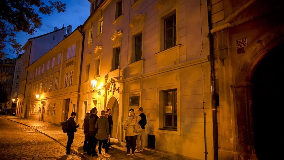 Group on Prague evening tour exploring Old Town legends.