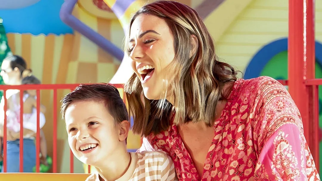 Family enjoying a ride at Dreamworld theme park.