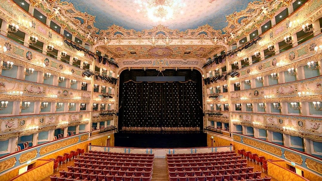 Fenice Theater interior with ornate balconies and stage, Venice.