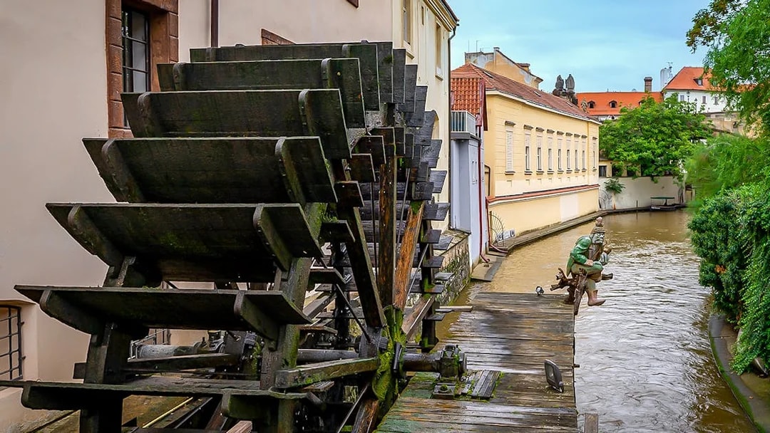 Water wheel on Devil's Channel during a sightseeing cruise in Prague.