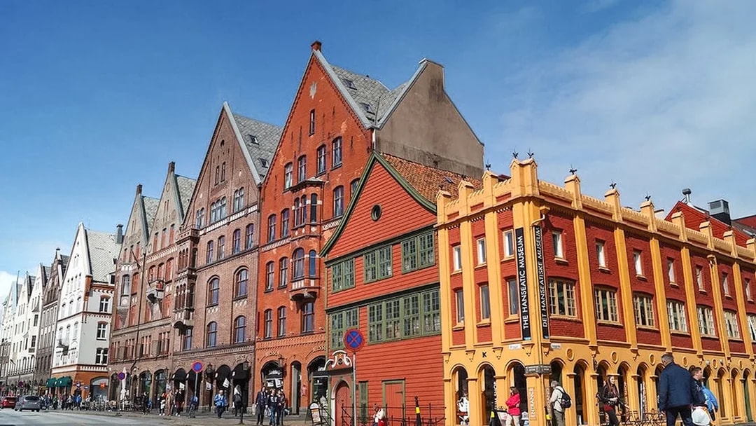 Colorful historic buildings in Bergen, Norway, along the sightseeing cruise route.