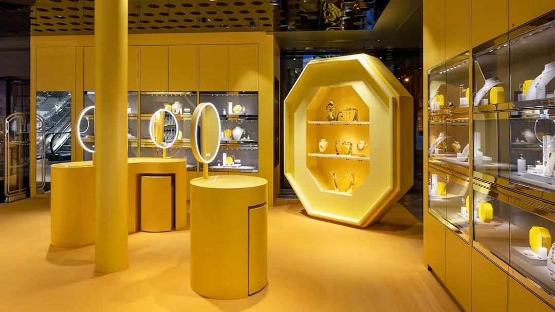 Swarovski House interior in Vienna showcasing jewelry displays and illuminated mirrors.