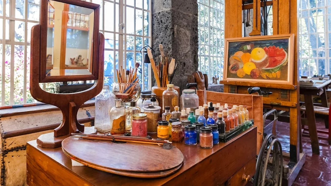 Art supplies and easel inside Frida Kahlo Museum, Mexico City.