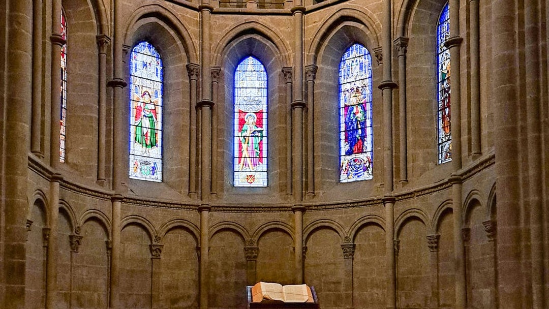 Stained glass windows inside St. Pierre Cathedral, Geneva, on a guided tour.