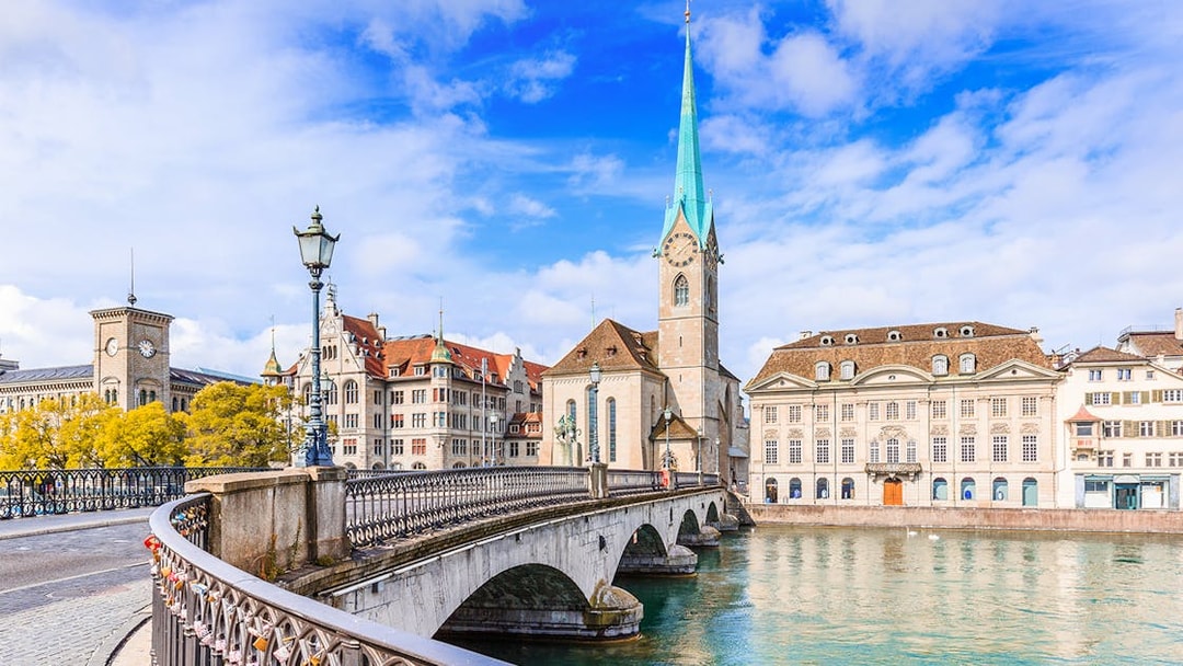 Zürich's Fraumünster Church and bridge over the Limmat River on a city tour.