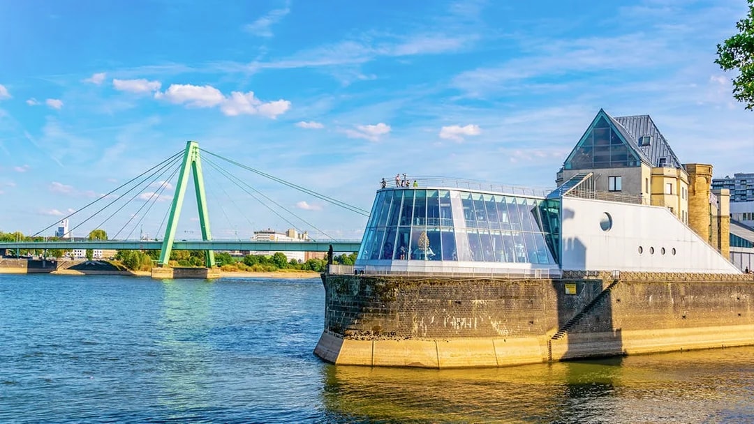 Cologne Harbour with modern building and bridge over the Rhine River.