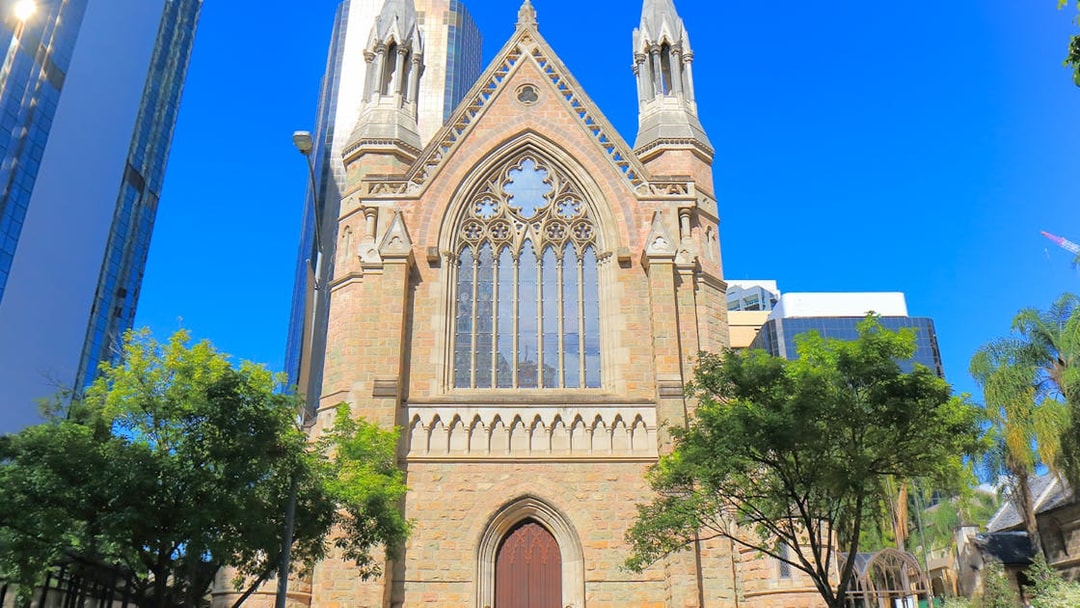 Gothic-style church facade on Brisbane walking tour.