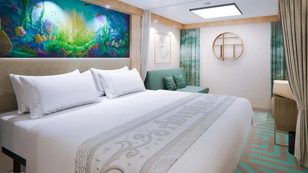 Deluxe Inside Stateroom with ocean-themed decor on Disney Adventure Cruise.