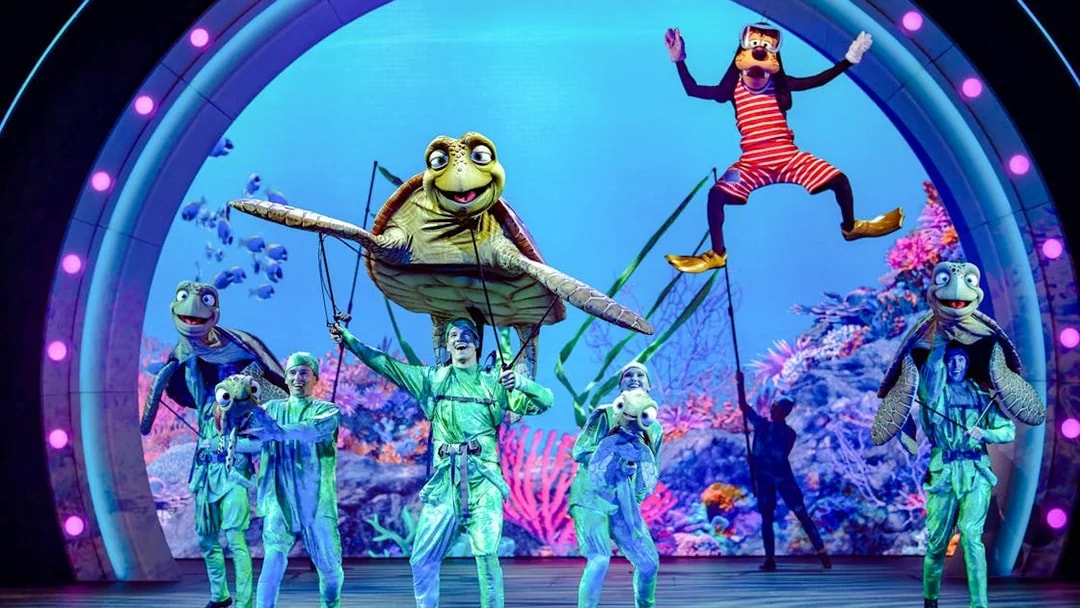 Live performance with sea creature puppets at Disney Adventure Cruise.
