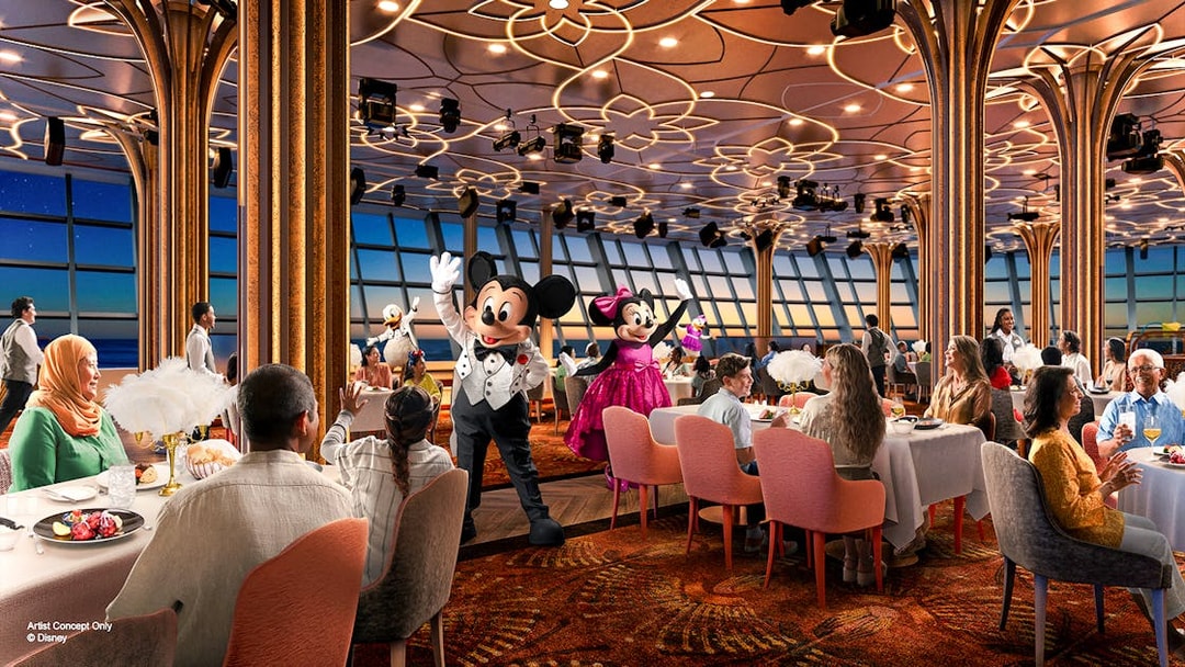Dining experience with Disney characters on a cruise from Singapore, featuring Mickey and Minnie Mouse.