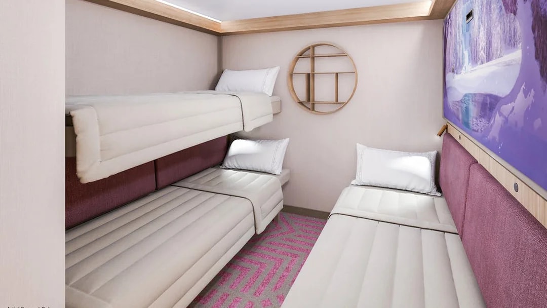 Inside stateroom with bunk beds and reef-themed decor on Disney Adventure Cruise.