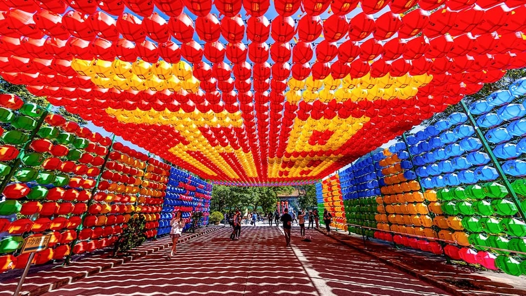 Colorful lantern tunnel in Tai O, Hong Kong, part of the 360 Tai O Pass experience.