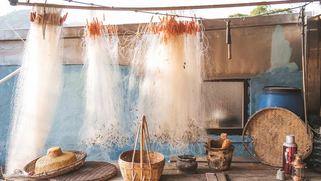 Fishing nets and baskets in Tai O village, Hong Kong, part of the 360 Tai O Pass experience.
