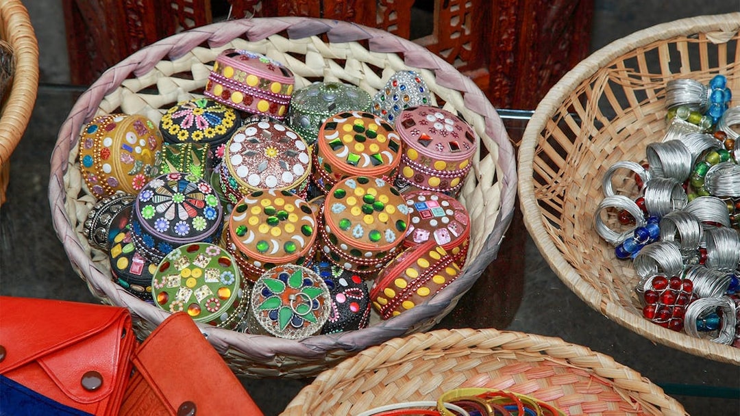 Colorful handcrafted boxes and jewelry at Granada's Silk Market.