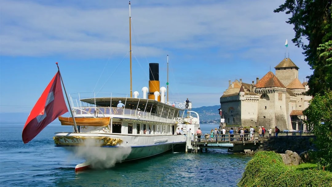 Steamboat docked near Chillon Castle on Lake Geneva, Switzerland.