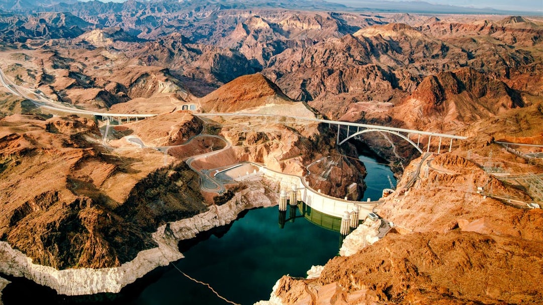 Aerial view of Hoover Dam and surrounding desert landscape, Nevada.