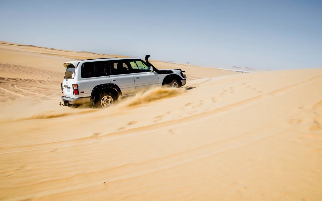 4x4 Desert Safari with Sandboarding & Camel Ride Tour from Cairo Image 5