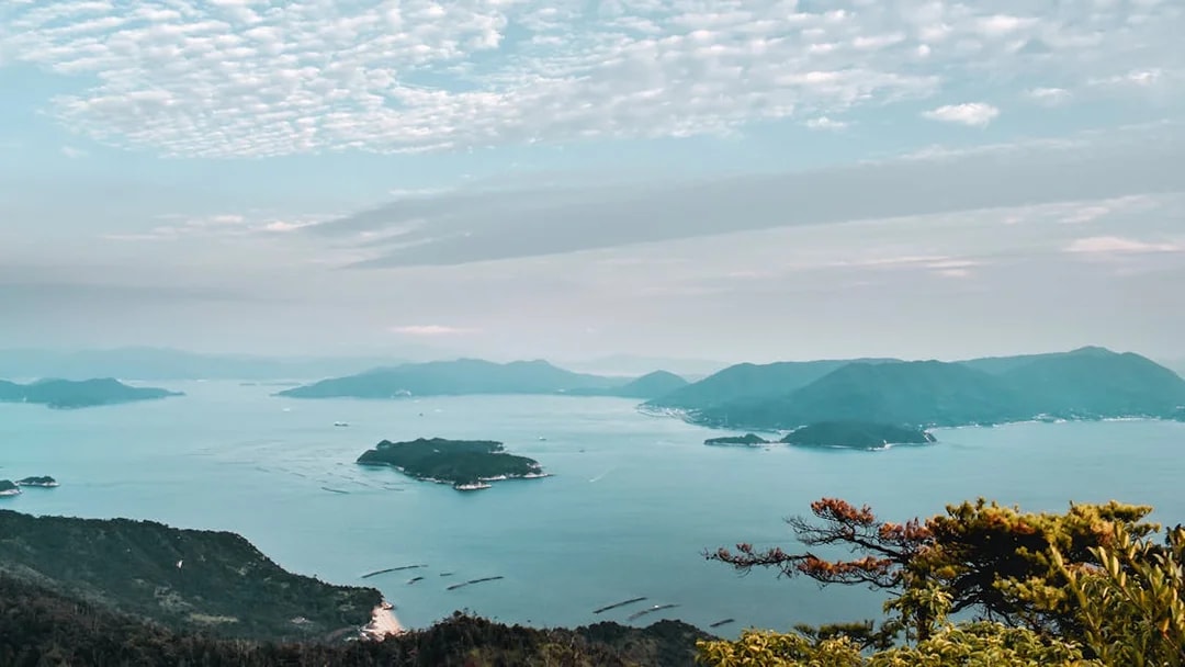 Hiroshima Seto Inland Sea view with islands and distant mountains.