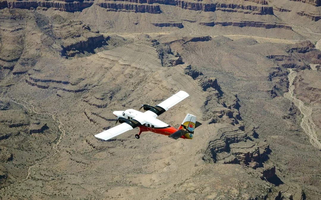 70- min Las Vegas to Grand Canyon West Airplane Tour with Helicopter Canyon Floor Landing & Pontoon Boat Ride Image 3