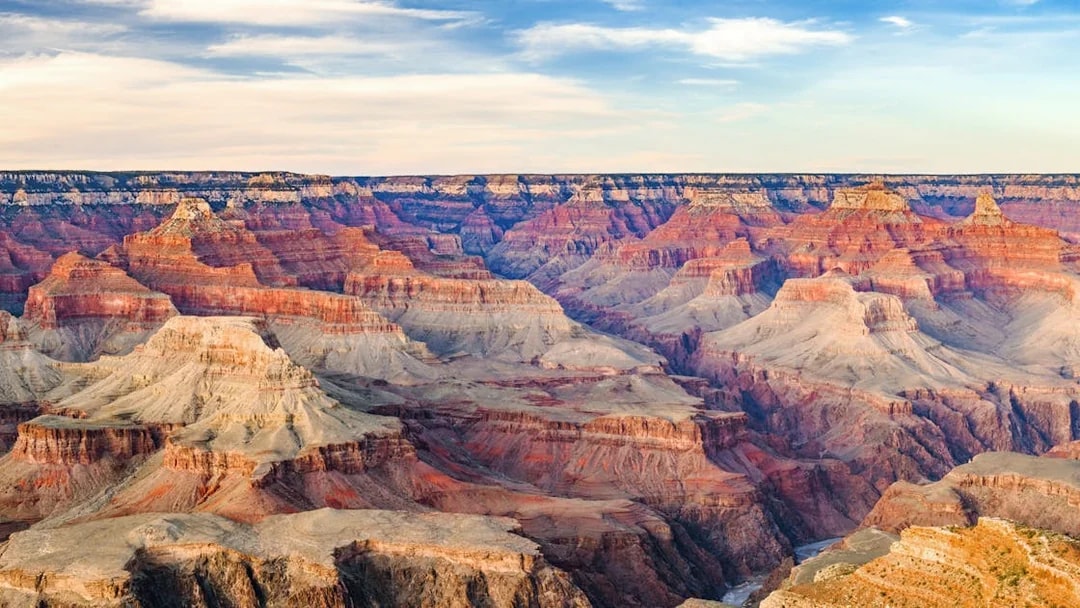 Panoramic view of the Grand Canyon's red rock formations.