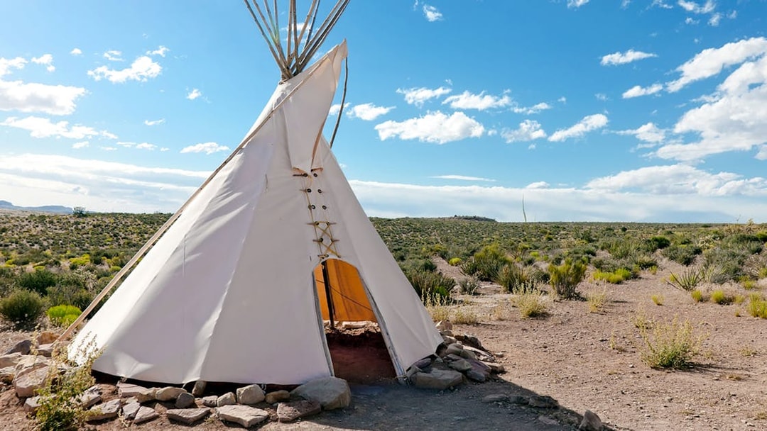 Teepee on desert landscape during Las Vegas to Grand Canyon West tour.