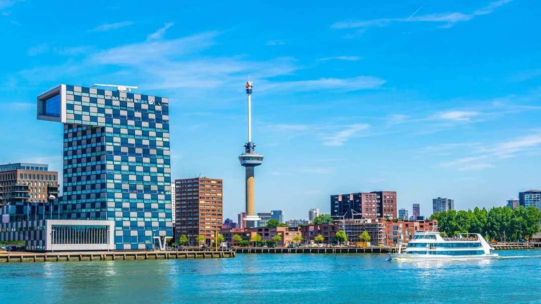 Euromast tower viewed from a Rotterdam cruise boat on the river.