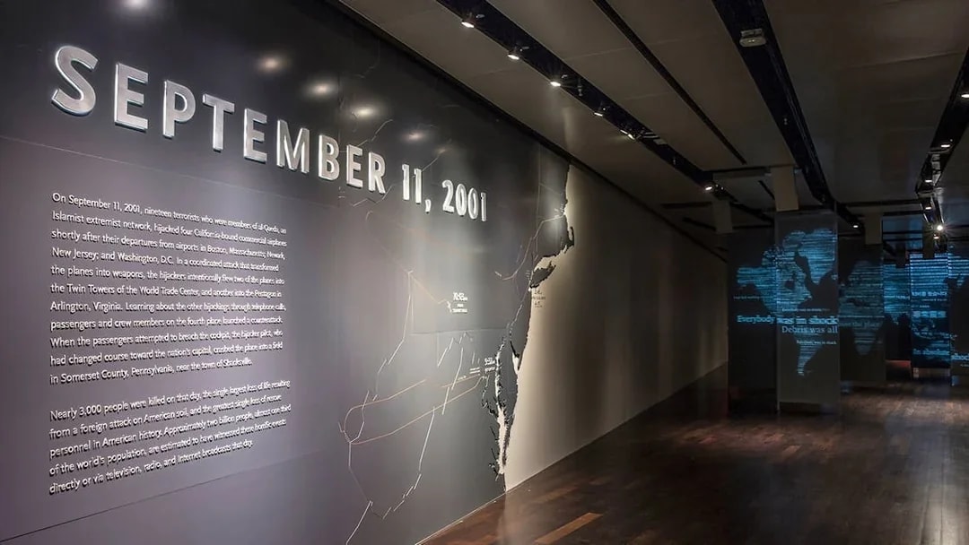 9/11 Museum exhibit with September 11, 2001 text and map display.