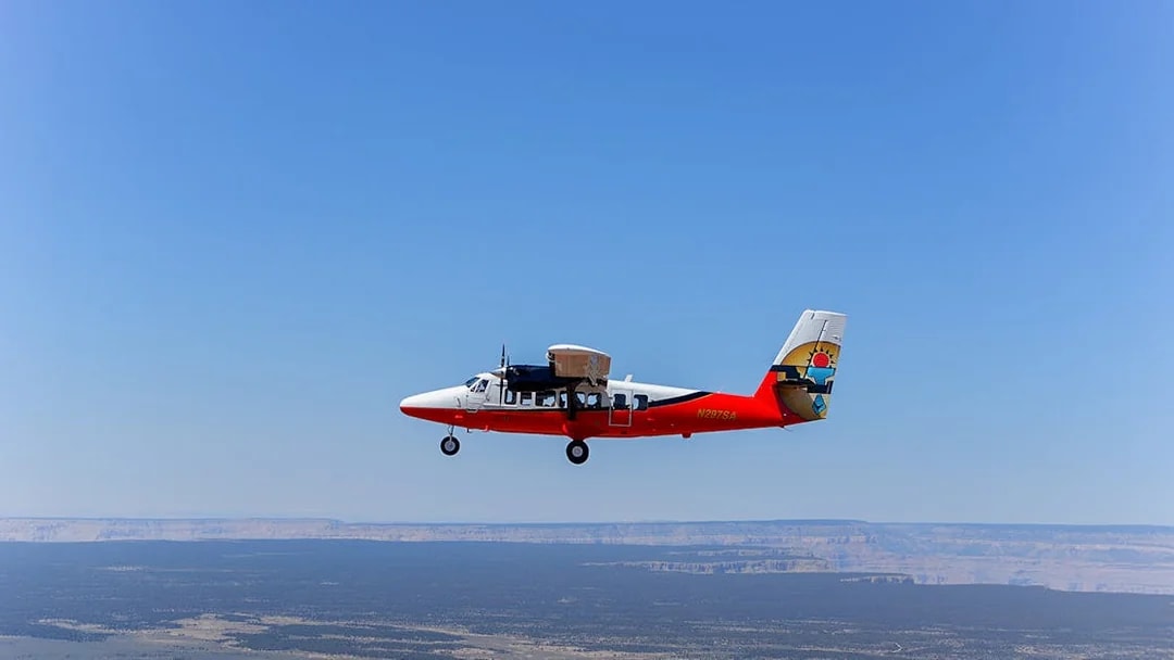 Helicopter flying over the Grand Canyon's North Rim.