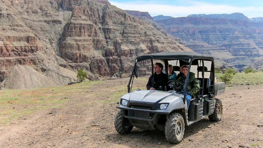 Jeep driving through rocky terrain on a self-drive excursion.