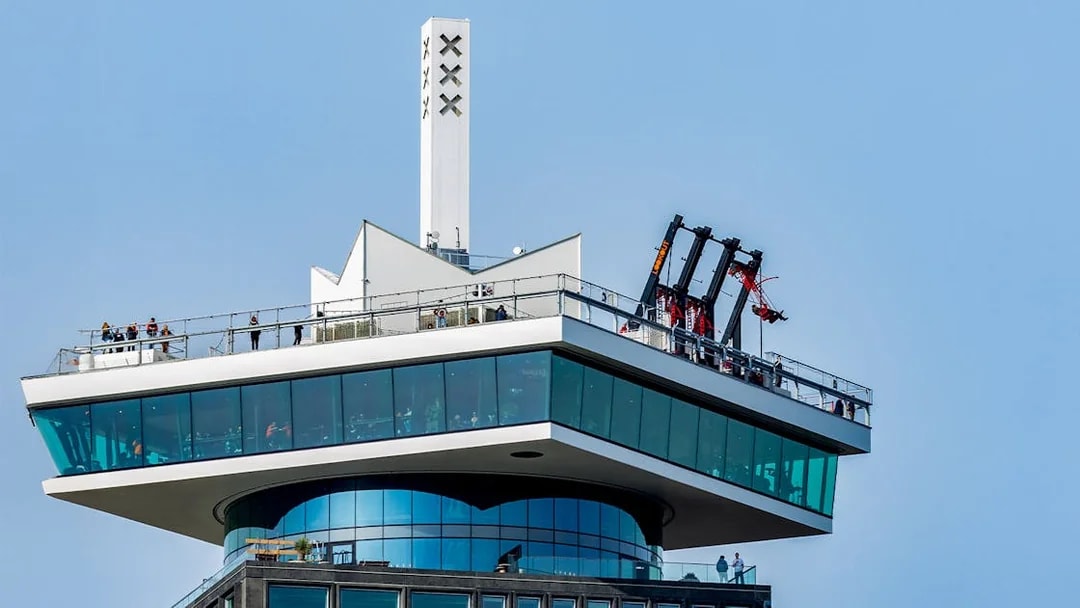 ADAM Lookout observation deck with swing attraction in Amsterdam during daytime.