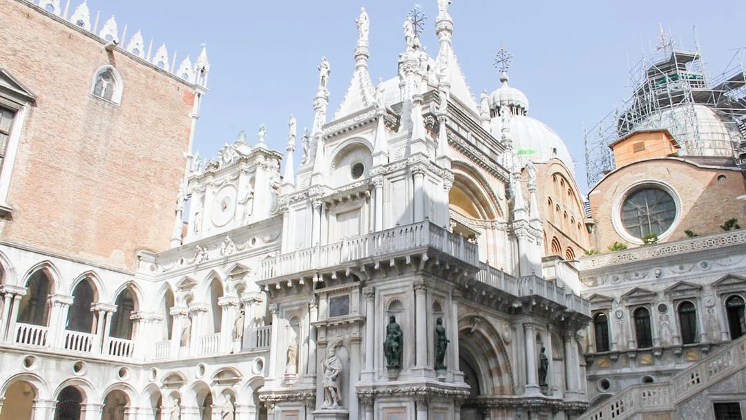 Doge's Palace courtyard with ornate architecture in Venice, Italy.