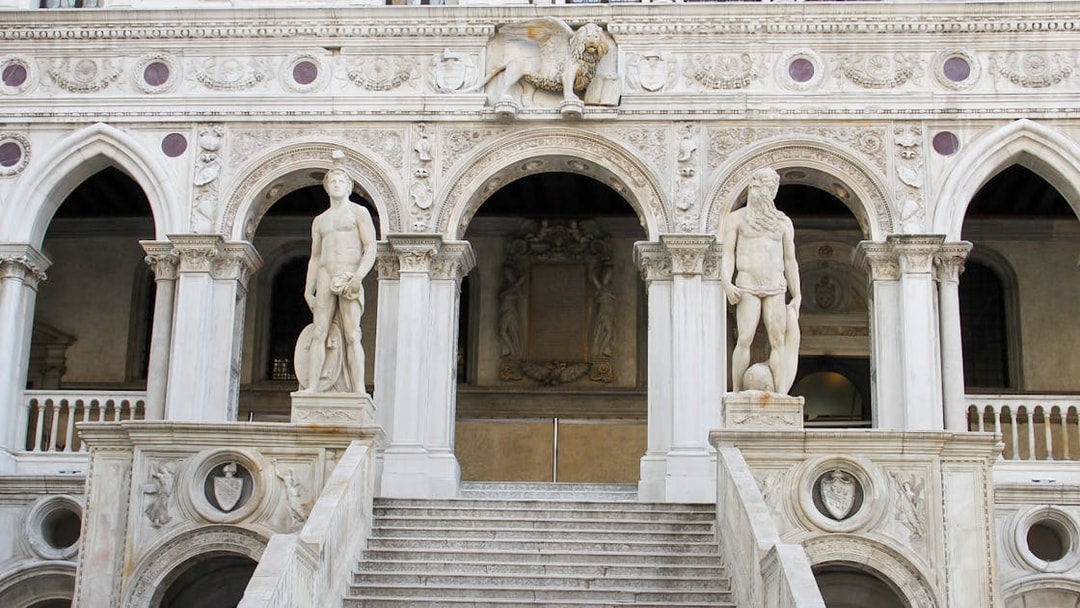Staircase with statues at Doge's Palace, Venice, Italy.