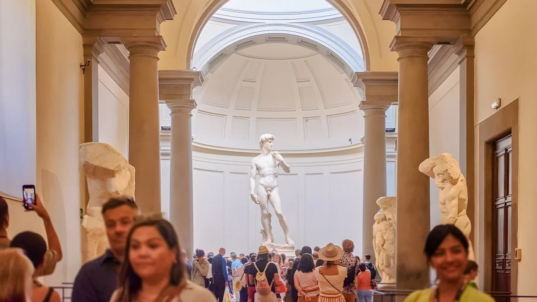 Crowd viewing Michelangelo's David in the Hall of Prisoners, Accademia Gallery, Florence.