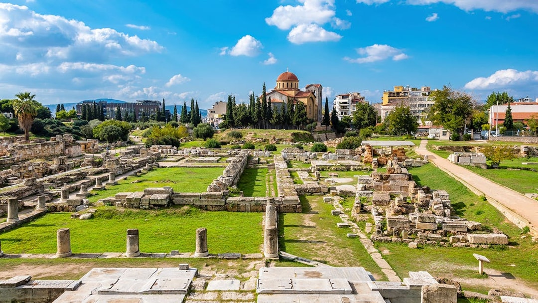 Kerameikos archaeological site with ancient ruins and church in Athens, Greece.
