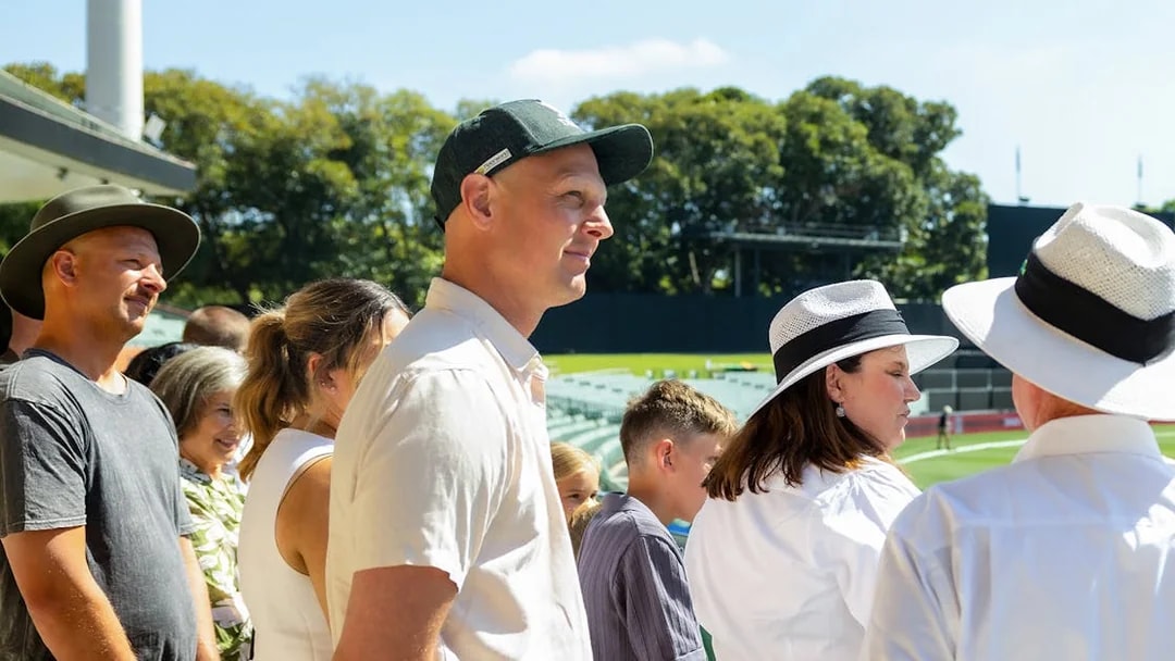 Visitors enjoying a sunny day at Adelaide Oval Stadium.