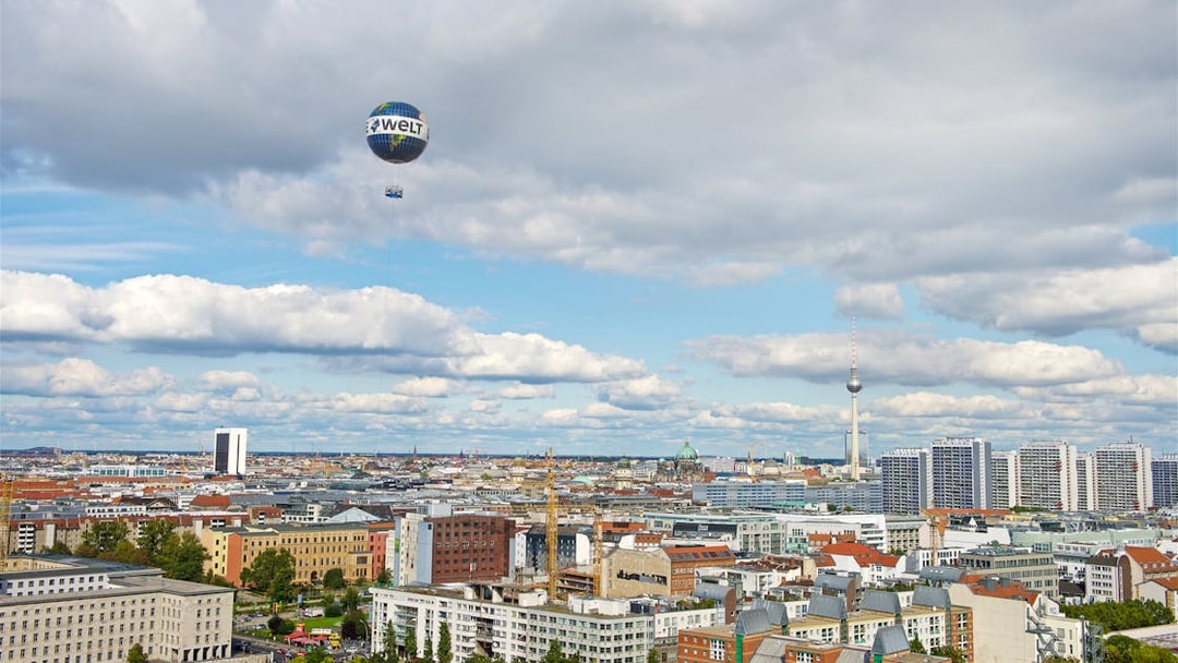Weltballon over Berlin skyline with TV Tower in view.