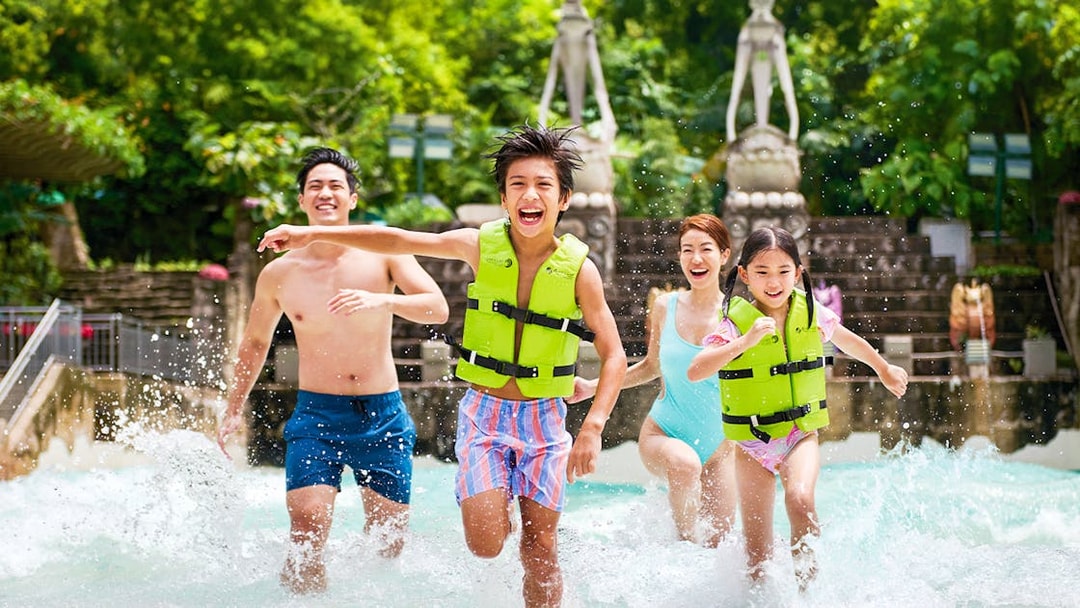 Guests enjoying the wave pool at Adventure Cove Waterpark™.