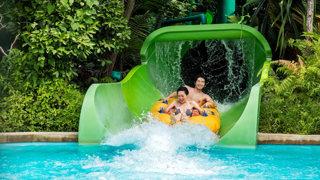 Visitors on the Tidal Twister ride at Adventure Cove Waterpark, Singapore.