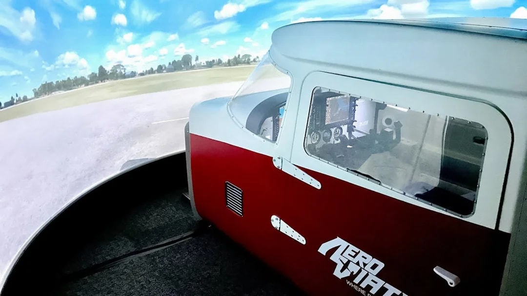Flight simulator cockpit at Aeroviation for a 100-minute full flight experience.
