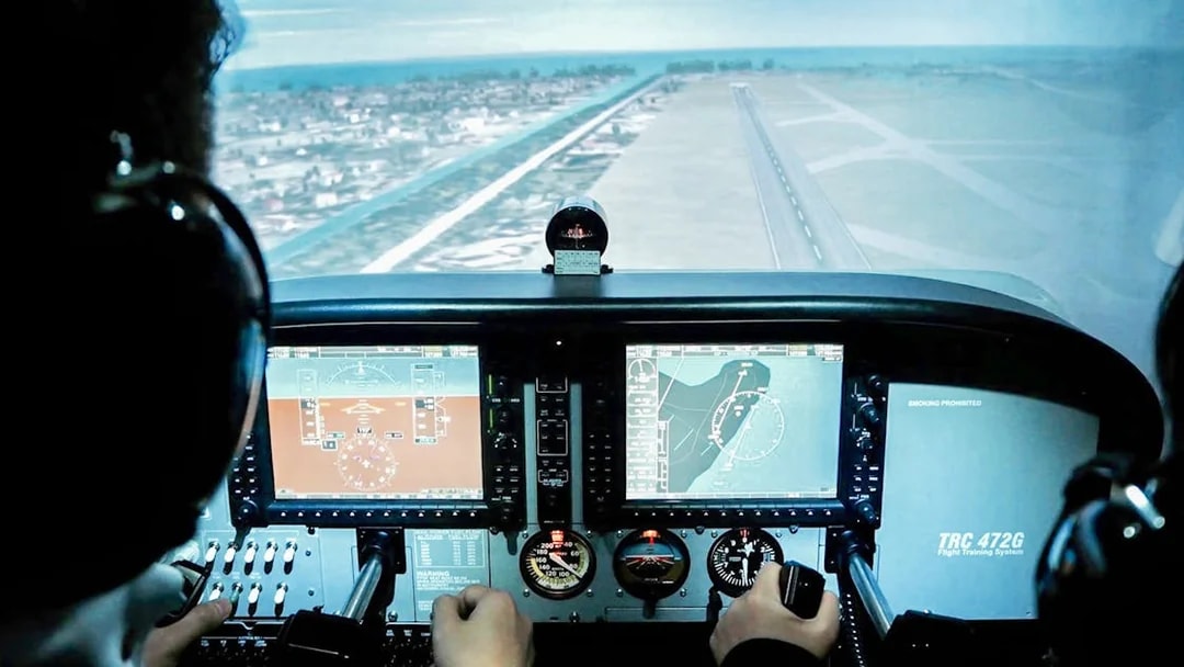 Flight simulator cockpit view during Aeroviation Full Flight Experience.
