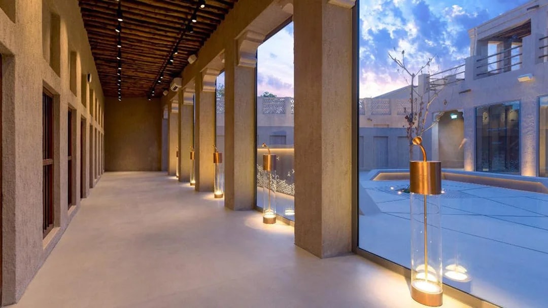 Al Shindagha Museum corridor with modern lighting and large windows.