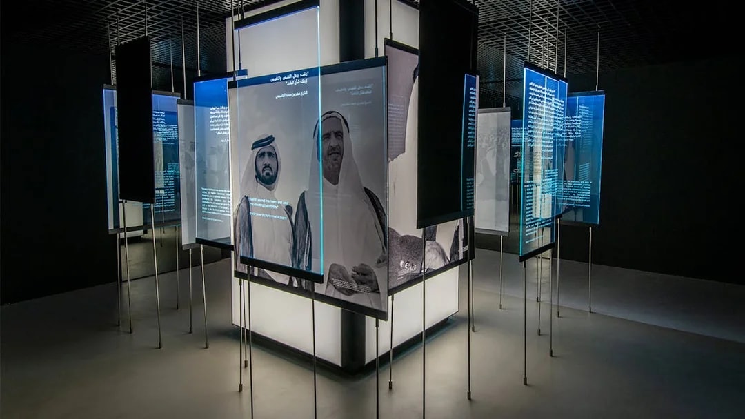 Interactive exhibit with historical figures and text at Al Shindagha Museum, Dubai.