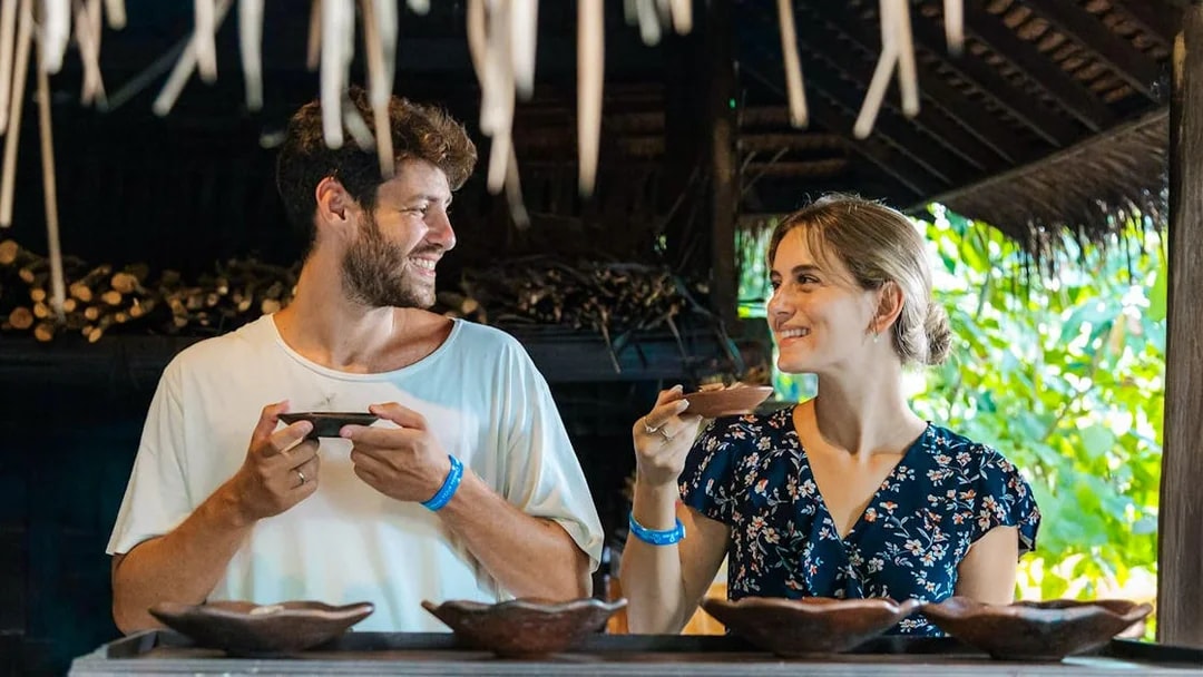 Couple enjoying coffee tasting at Alas Harum, Bali.