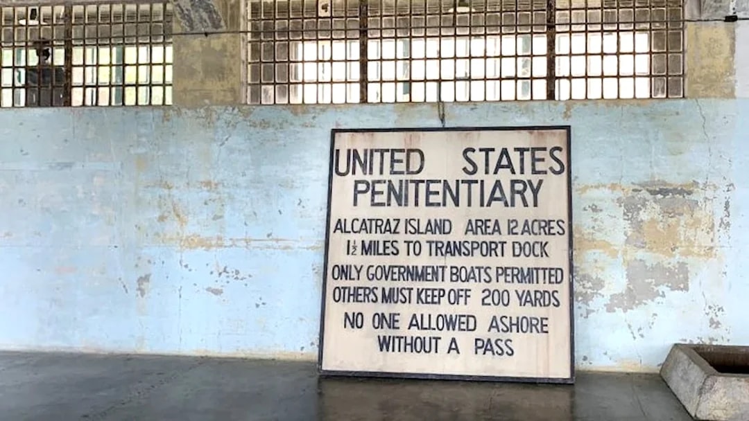 Alcatraz Island penitentiary sign inside historic prison, San Francisco Bay.
