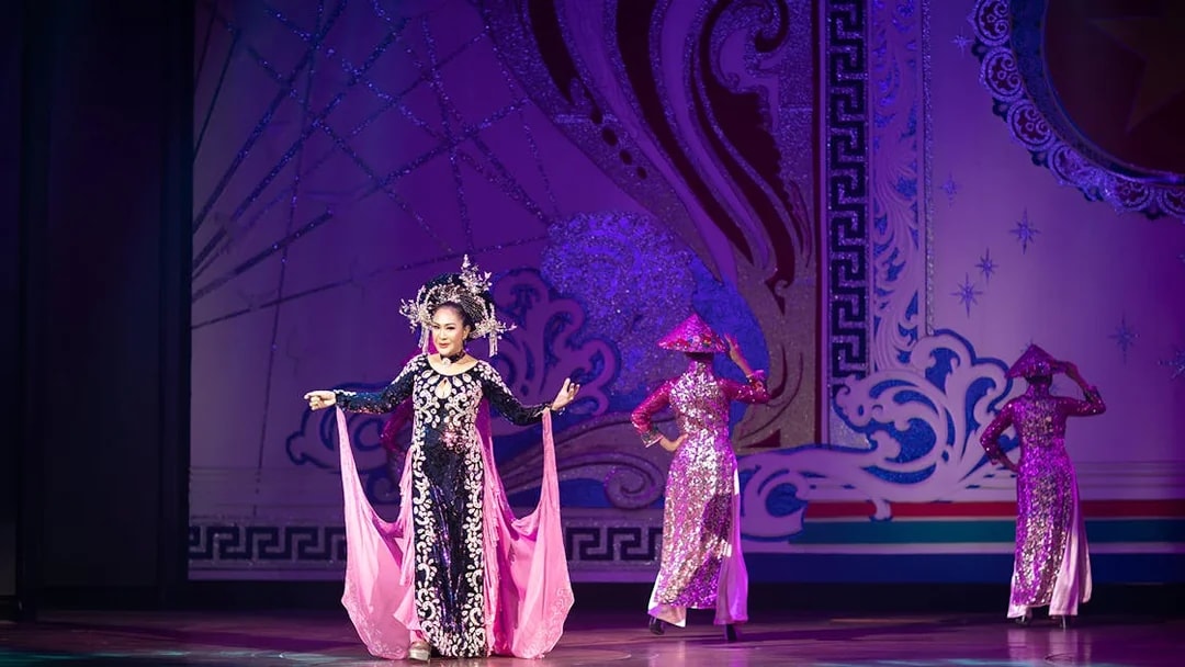 Performer in traditional costume on stage at Alcazar Cabaret Show, Pattaya.