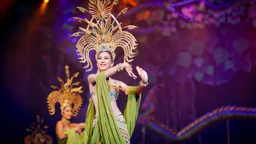 Performer in elaborate costume at Alcazar Cabaret show, Pattaya.