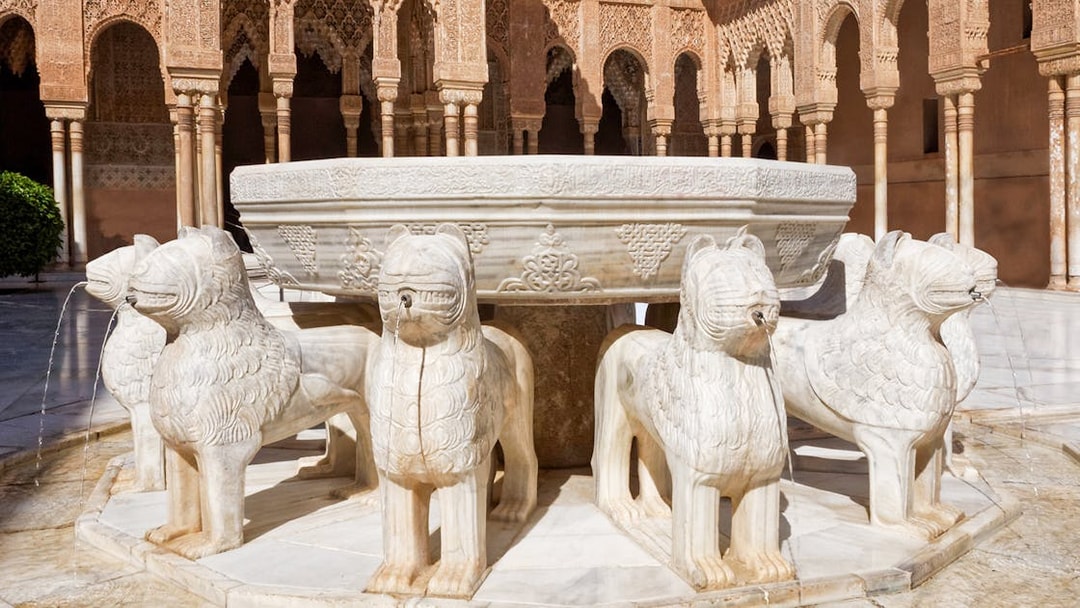 Lion Fountain in the Court of the Lions, Alhambra, Granada, Spain.