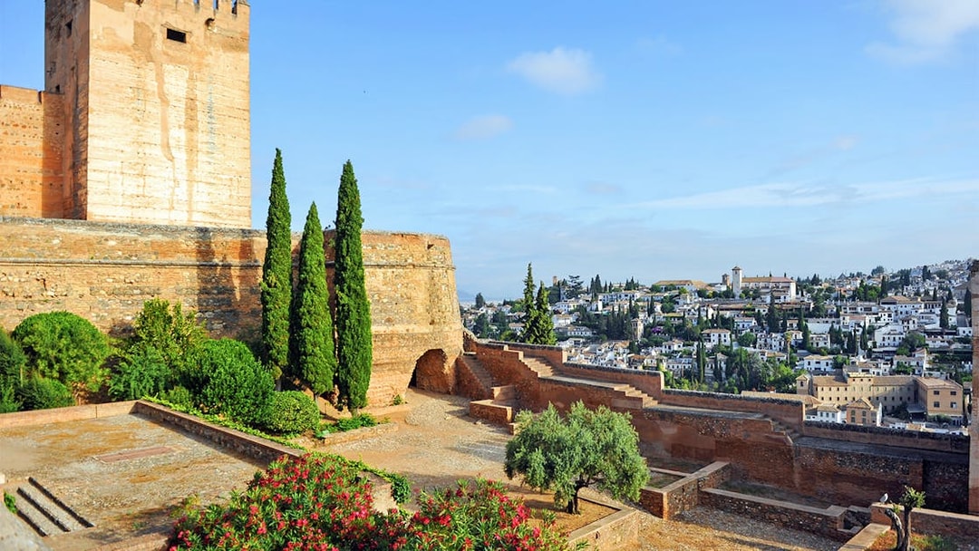 Alcazaba fortress and gardens with view of Granada, Spain.