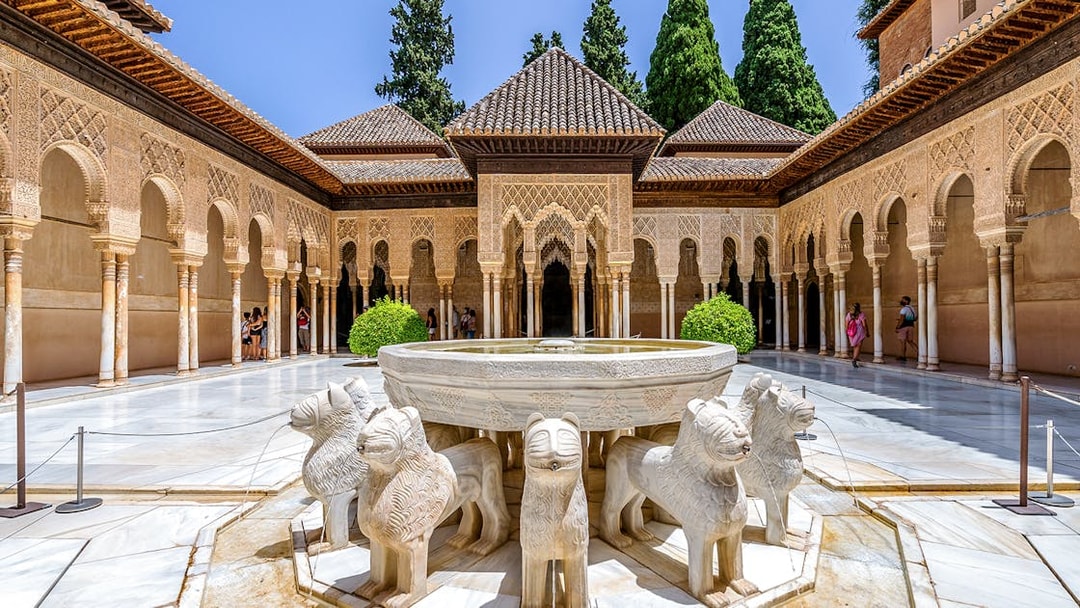 Court of the Lions fountain in Nasrid Palaces, Alhambra, Granada, Spain.