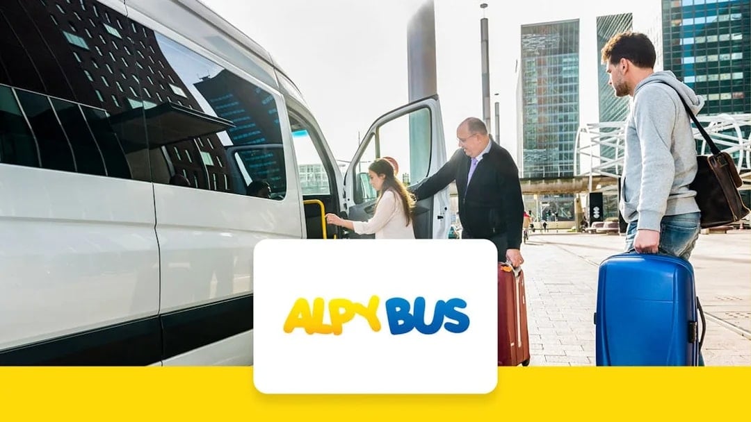 Passengers boarding AlpyBus shuttle at Geneva Airport for Morzine transfer.